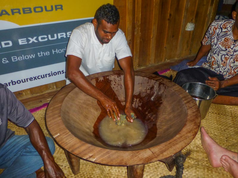 Mixing the Plant Root with water, ready for Drinking the Kava