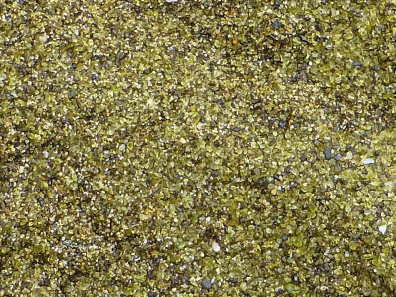 The Green Olivine Crystals on the beach in Hawaii