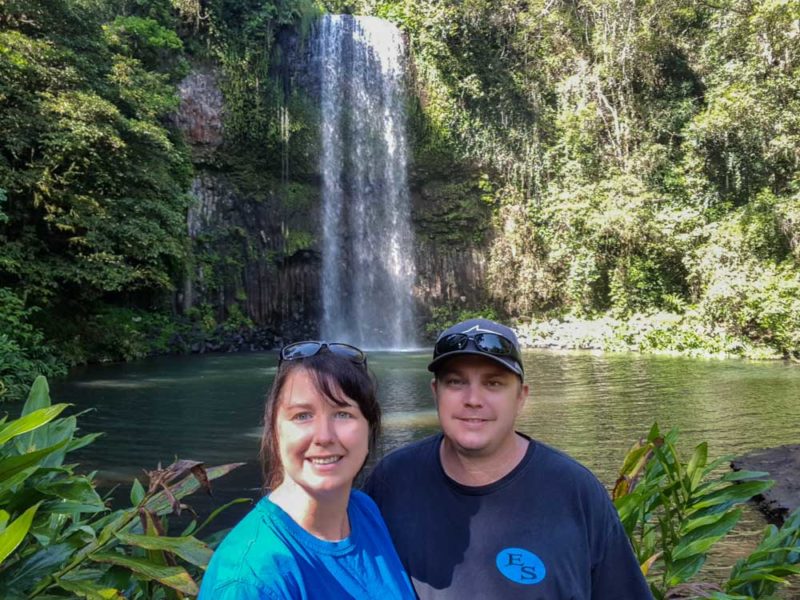 Us standing in front of Millaa Millaa, The most photographed waterfall in Australia