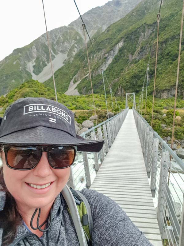 Chris walking over one of the swing bridges on the hooker valley track