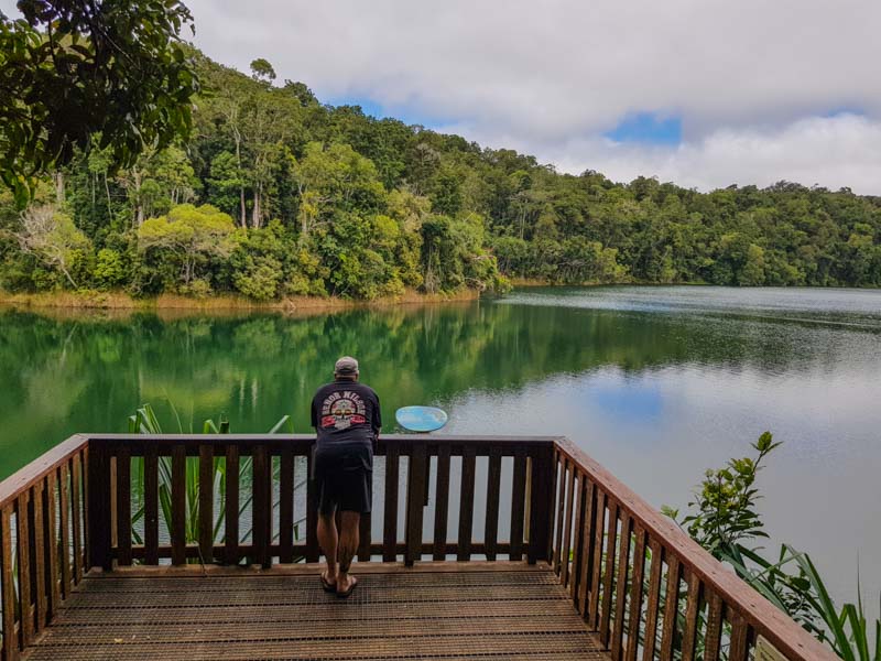 Matt on a platform looking out onto Lake Eacham