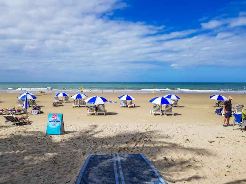 Four Mile Beach and umbrellas
