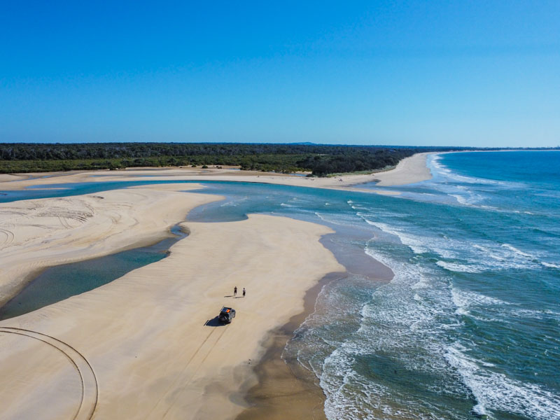 Drone shot of 4 Wheel Driving along Kinkuna Beach